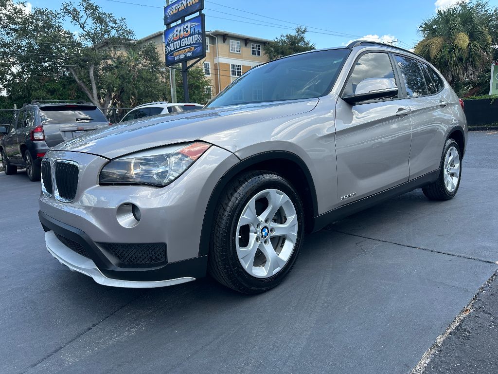 Used 2015 BMW X1 28i with VIN WBAVM1C59FV316352 for sale in Tampa, FL